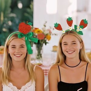 Kids fruit themed party headbands featuring strawberry and apple designs with green bows