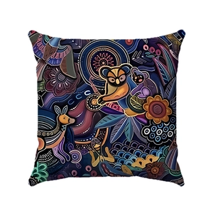 Close-up of geometric linen cushion cover with ethnic boho kangaroo and koala art