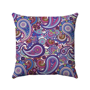 Close-up of vibrant paisley pattern on linen pillowcase with intricate ethnic design details