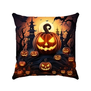 Detail of square Halloween cushion cover with glowing pumpkin and gothic castle print