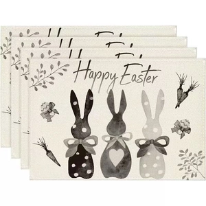 Set of 4 Easter placemats featuring textured gray bunny prints and Happy Easter text