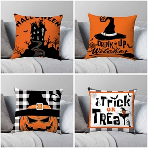 Set of four Halloween pillow covers with haunted castle, witch hat and pumpkin patterns