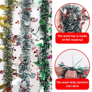 Close-up of 2m green Christmas tinsel garland with PET leaves and internal wire for shaping