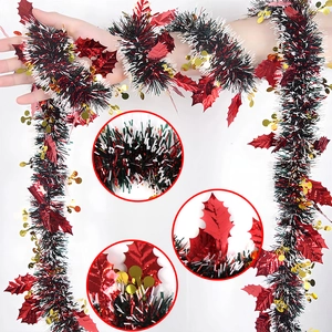 Christmas garland with green leaves and red berries for festive party tree decorations