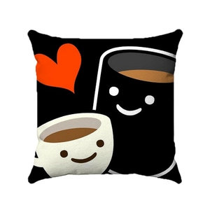 Detail of minimalist coffee cup and heart print on black cotton linen cushion cover