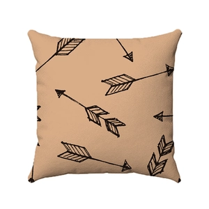 Macro detail of camel square pillowcase with black hand-drawn arrows on woven fabric