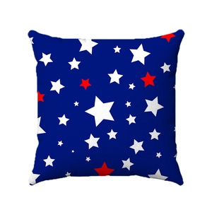Detailed view of square linen pillowcase with blue background and red white stars