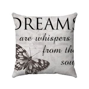 Soft square throw pillow with Dreams quote and butterfly on grey marble background