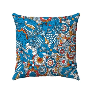 Close-up of geometric bohemian mandala patterns on a decorative square pillowcase