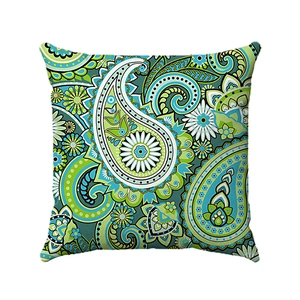 Macro detail of geometric paisley pattern on square bohemian decorative pillow cover