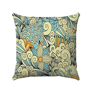 Detail of bohemian geometric pattern on square pillowcase with intricate floral graffiti