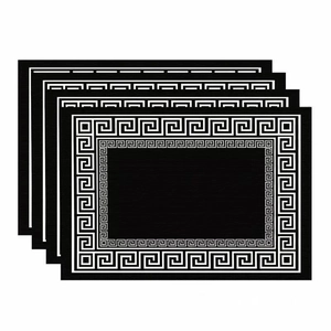 Set of 4 black geometric placemats with white Greek key pattern for dining tables