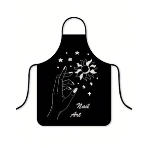 Detail of black waterproof apron with white Nail Art print and celestial motifs