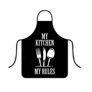 Detail of waterproof black kitchen apron with My Kitchen My Rules print and cutlery