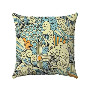 Bohemian geometric cushion cover with artistic hand-drawn patterns in blue and orange
