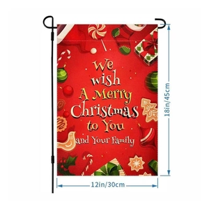 Christmas garden flag with festive ornaments and merry greeting on a decorative stand