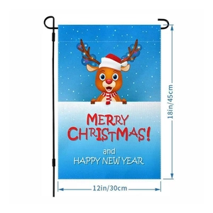 Vertical garden flag detail showing a cartoon reindeer on blue weather-resistant fabric
