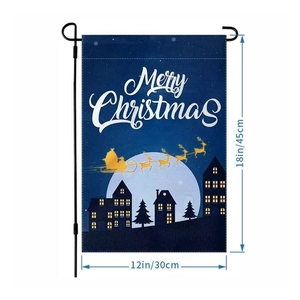 Detail view of a 12x18 inch Christmas garden flag with Santa and reindeer scene
