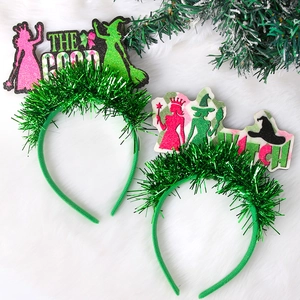 Green tinsel Wicked Witch headbands with glitter crown and lettering for party photo props