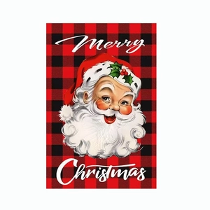Detail of Christmas garden flag with vintage Santa Claus on red and black buffalo plaid