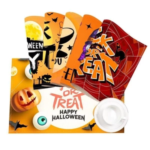 Set of 4 Halloween placemats featuring pumpkin, black cat, and bat designs with orange themes
