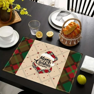 Christmas reindeer placemat with Merry Christmas print on dark wooden dining table