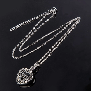 Roestvrijstalen hartvormige urn ketting voor as met MOM gravure en zilveren ketting