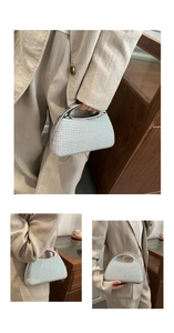 Detail of silver chain bag with pearls, metal handle and stylish studs for women