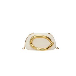 Elegant cream woven evening clutch bag with distinctive gold metal handle and chain strap