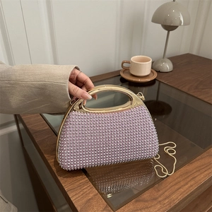 Chic lilac rhinestone handbag with gold handle and chain strap for evening events