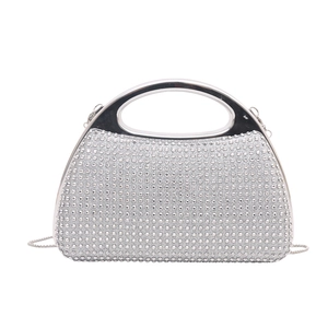 Elegant silver rhinestone clutch bag with a metallic handle and a fine chain strap