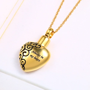 Golden heart-shaped perfume bottle urn necklace with Always in my heart engraving
