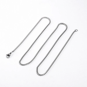Detail of silver stainless steel box chain necklace with secure lobster clasp closure