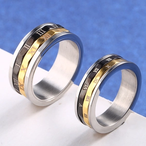 Polished stainless steel couple rings with rotating Roman numeral black gold band