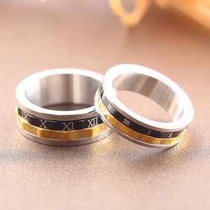 Rotating stainless steel rings for couples with Roman numeral patterns and metallic finish