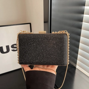 Chic black glitter mini square clutch bag with gold chain strap and metal clasp closure