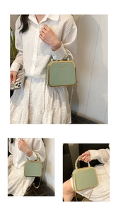 Detail of light green octagonal crossbody bag with gold frame and twisted top handle