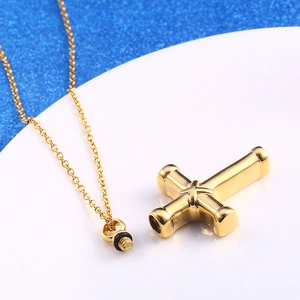 Polished gold stainless steel cross cremation pendant necklace with screw cap detail