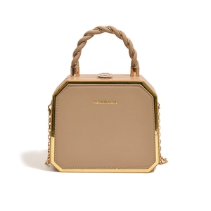 Chic beige octagon crossbody bag with woven handle and gold chain strap detail