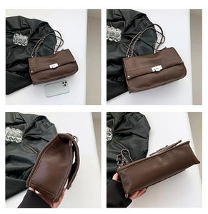 Detailed views of dark brown lychee grain leather messenger bag with silver twist lock