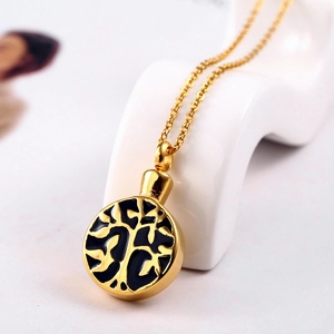 Detailed close-up of golden Tree of Life urn pendant with a polished finish and O-chain