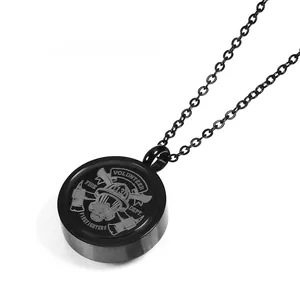 Macro detail of stainless steel firefighter memorial pendant with volunteer badge engraving