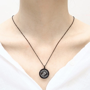 Black stainless steel USMC military urn necklace with engraved United States Marine Corps logo