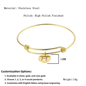 Polished stainless steel adjustable bracelet with a 14mm round H-engraved gold charm