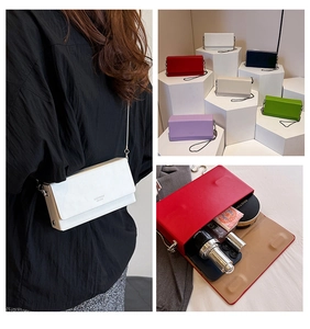 Interior view of leather chain bag showing space for lipstick and cosmetics