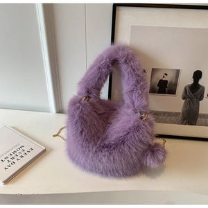 Purple faux fur plush handbag with gold chain strap, detailed view of soft fluffy texture.