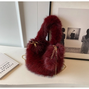 Burgundy fluffy plush handbag with gold chain strap, stylish soft winter cross body shoulder bag.