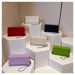 Group display of chic rectangular chain crossbody bags in six vibrant trendy colors