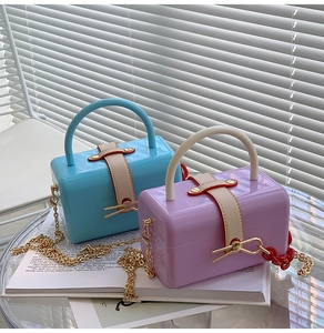 Fashionable mini box bags in sky blue and lavender with acrylic finish and gold chains