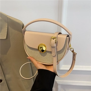 French half-moon crossbody bag in nude leather and woven fabric with gold buckle